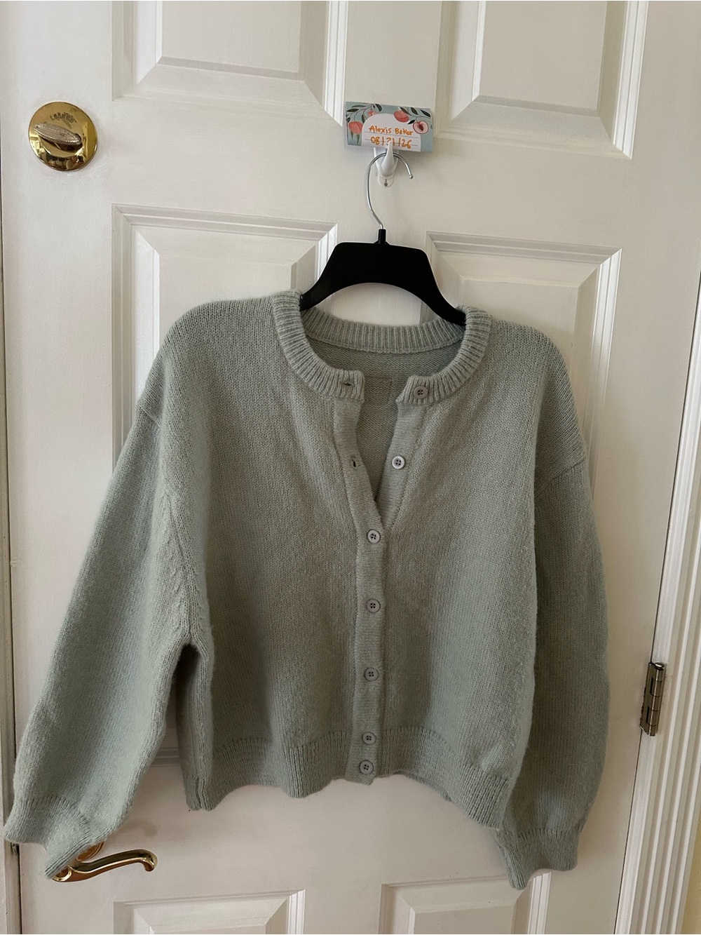 Daily drills button up sweater in the color harbor, size xs/s